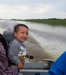 Babies drive boats in Fort Chipewyan.